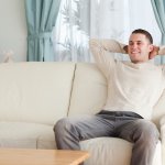 Happy man on couch