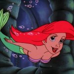 ariel swimming past the camera