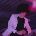 Charles Leclerc dancing in wig