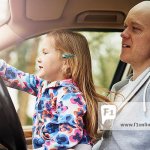 MAGA Moron Man driving with child in lap no seatbelt