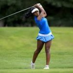 Girl golfing