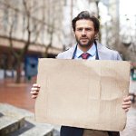 man holding sign