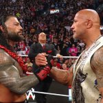 Roman Reigns and The Rock handshake