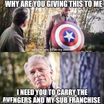 February 14th enter a Brave New World | WHY ARE YOU GIVING THIS TO ME; I NEED YOU TO CARRY THE AVENGERS AND MY SUB FRANCHISE | image tagged in old captain america gives shield to falcon,captain america | made w/ Imgflip meme maker