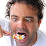 Man eating Pills