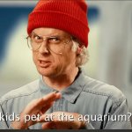 Kids Pet At The Aquarium