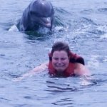 swimmer and dolphin