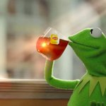 Kermit the frog sipping tea