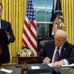 Trump signs