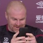 Sean Dyche Holding Phone