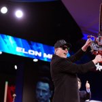 Elon Musk Waving Chainsaw