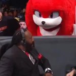 Knuckles staring at Booker T