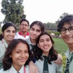 Boy in red shirt with classmates meme