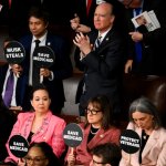 Democrats holding up signs meme