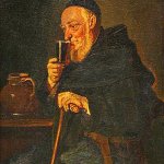 Monk drinking wine