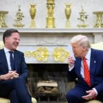 Trump  & Rutte fireplace bling