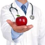 Doctor holding apple