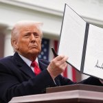 Trump, pretending he's a king, holds up an executive order. meme