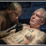 Van Hollen gets MS13 tattoos
