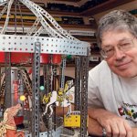 Man with erector set carousal.