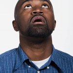 Mid Adult African American Man Looking Up