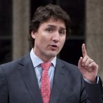 Justin Trudeau pointing up