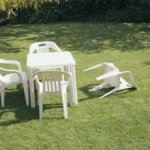 Patio set with chair overturned