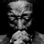 praying black guy