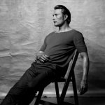 Mads Mikkelsen in a Chair