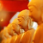 Spiritual orange Buddha