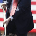 Shovelling his crap