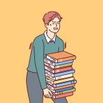 Guy carrying books