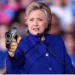 Hillary with a .45