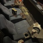 people throwing popcorn in minecraft movie