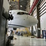 Airplane peeking around corner