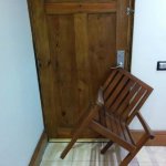 Chair holding door