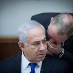 Bibi being whispered to