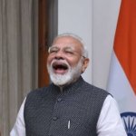 Modi laughing