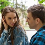 Young woman flirting with man