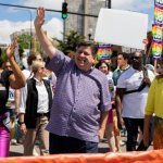 Gov Pritzker gets photobombed at Pride