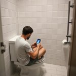 Guy on Toilet playing games