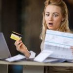 woman surprised visa bill