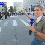 Reporter shot by police