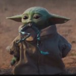 Grogu eating frog