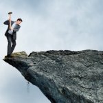 man breaking cliff