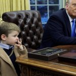 Kid picks nose oval office