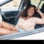 Black Woman in Car