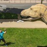 Guy fighting a Dinosaur