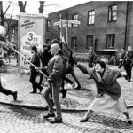Lady beats Nazi with purse