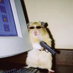 rat gun near computer